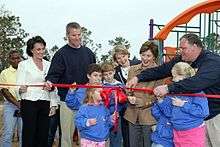 Brett Favre, third from the left; his wife Deanna, second from the 