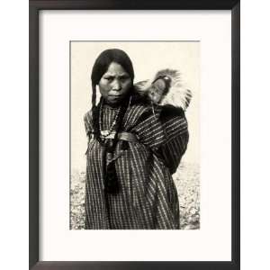 Woman from an American Indian Tribe with a Baby Resting in a Basket on 