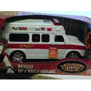   Rise Monster Garage Motorized Pop A Wheelie Ambulance: Toys & Games