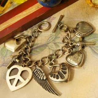Vintage Bronze Charms Freedom Peace Symbol Cross Heart Wing Bracelet 