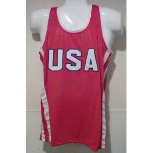  Carl Lewis Autographed/Hand Signed 1984 Red Olympic USA 