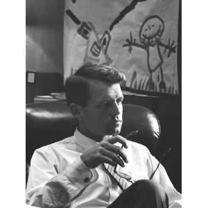 Robert F. Kennedy Sitting in Office in Front of Childs Painting 