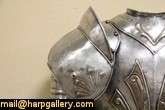   set of wearable armor and a helmet are about 60 years old and fit a