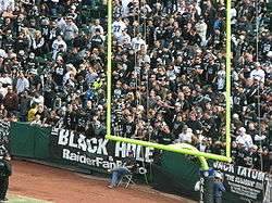 The Black Hole (sections 104, 105, 106, and 107) during a Raiders home 