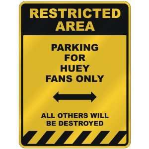  RESTRICTED AREA  PARKING FOR HUEY FANS ONLY  PARKING 