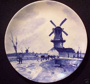 Royal Delft charger, depicting a windmill and cows  