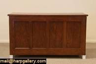 Paneled in oak with a maple butcher block top, an antique store 